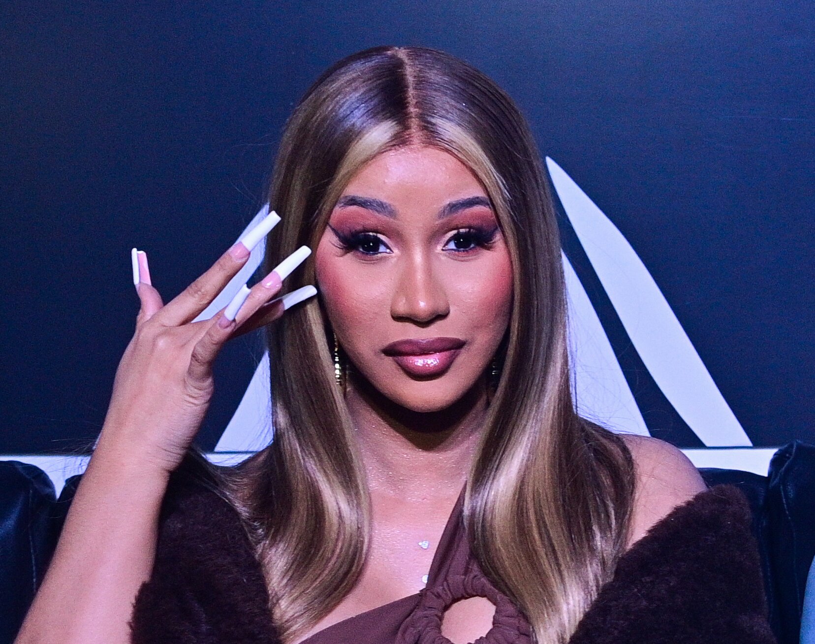 Cardi B Had a Fun Matchy-Matchy Moment With Her Wig and Boots | HelloGiggles