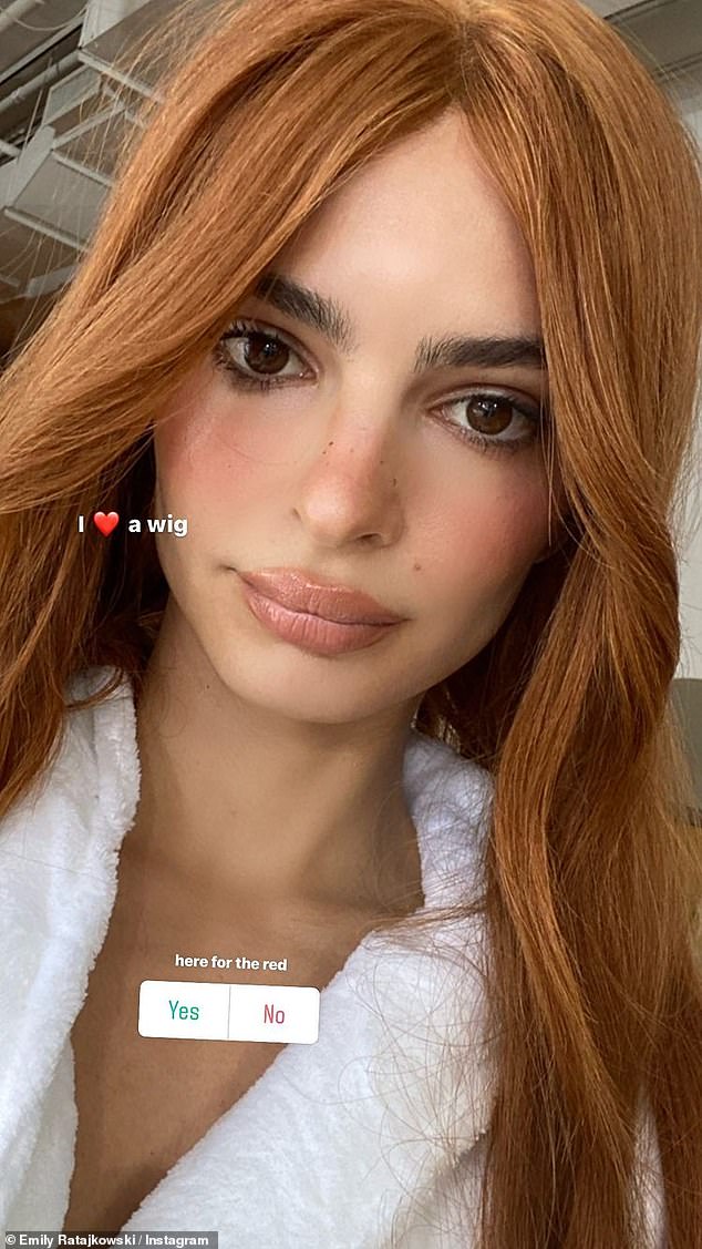 Emily Ratajkowski changes her hair color as she tries on wigs and asks fans,